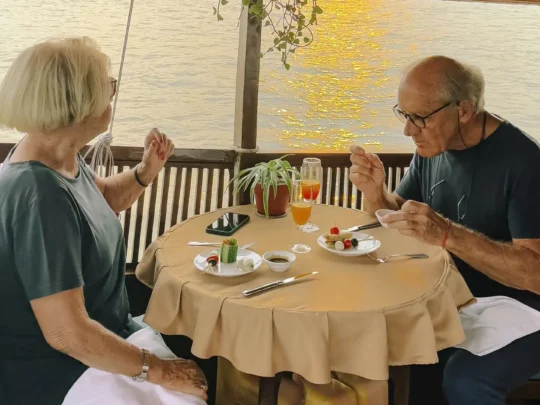 Guests enjoying a special dinner on the boat – Can Tho Sunset Tour by Mekong Smile