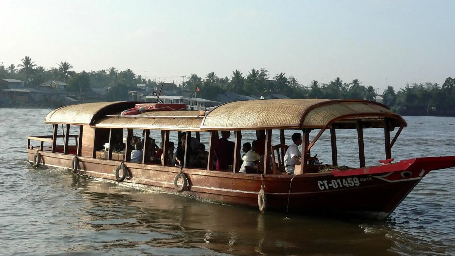 Best 10 Travel Agents in Mekong Delta 413 TransMekong boat tour cruising along the Mekong River in southern Vietnam
