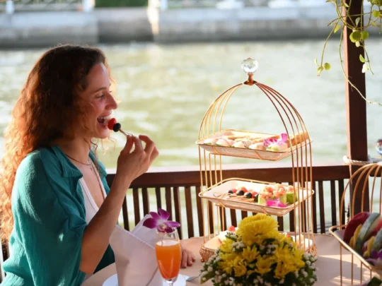 travelers enjoying light snacks on the boat – Can Tho Sunset Tour by Mekong Smile