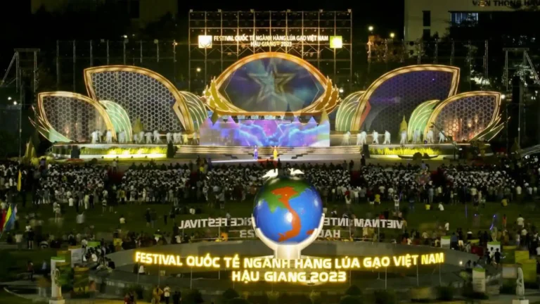 Illuminated stage and audience at the 2023 Vietnam International Rice Festival in Hau Giang