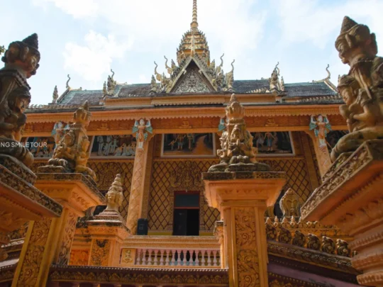 A close-up shot highlighting the unique and colorful details of Khmer architecture at Phu Ly Pagoda