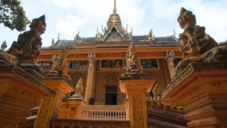 A close-up shot highlighting the unique and colorful details of Khmer architecture at Phu Ly Pagoda