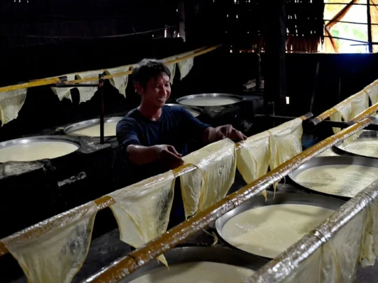 Inside a traditional tofu skin workshop in Vinh Long, a cultural stop on the Me Kong Smile tour