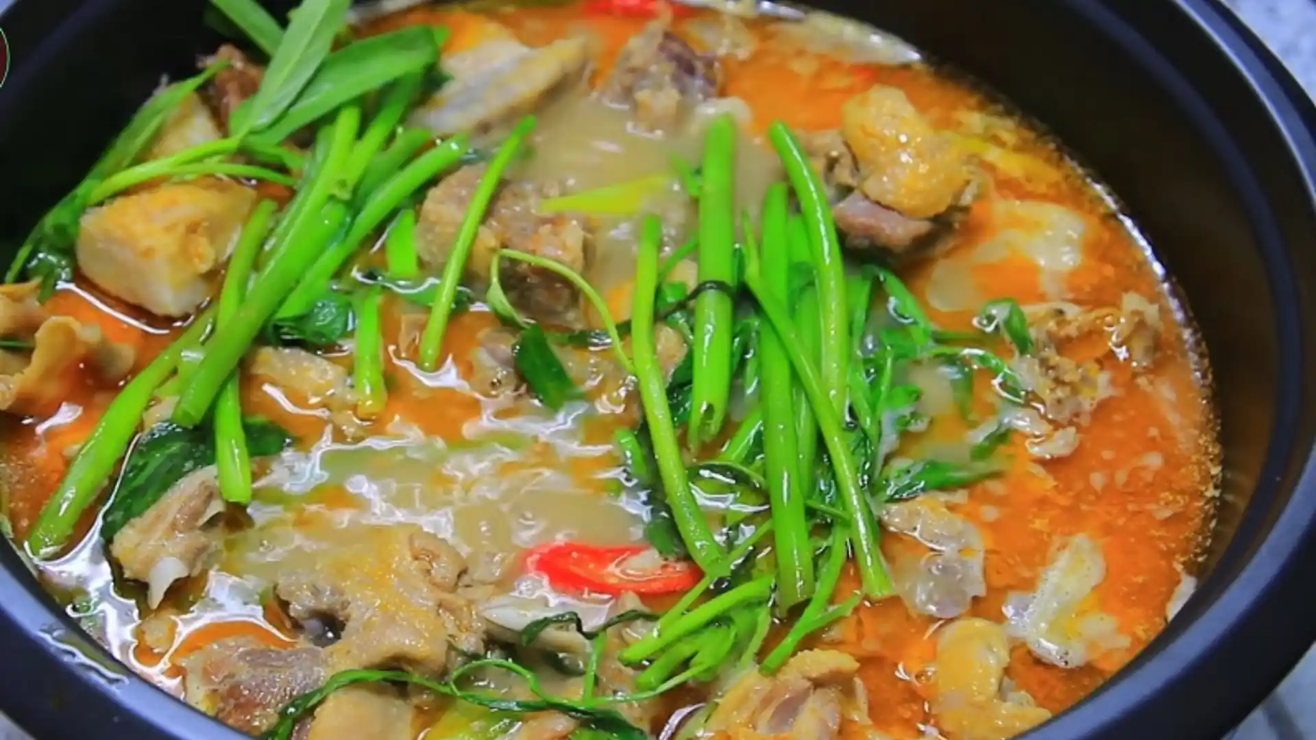 What to Eat in Vietnam: 30 Must-Try Dishes 101 Hotpot of vịt nấu chao with duck, fermented tofu broth and vegetables