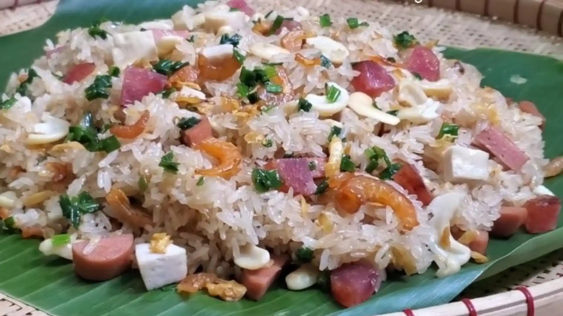 What to Eat in Vietnam: 30 Must-Try Dishes 77 Savory Vietnamese sticky rice topped with meat and sausage
